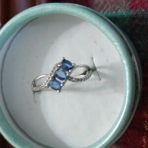 Elegant Silver Ring with Topaz Blue Accents